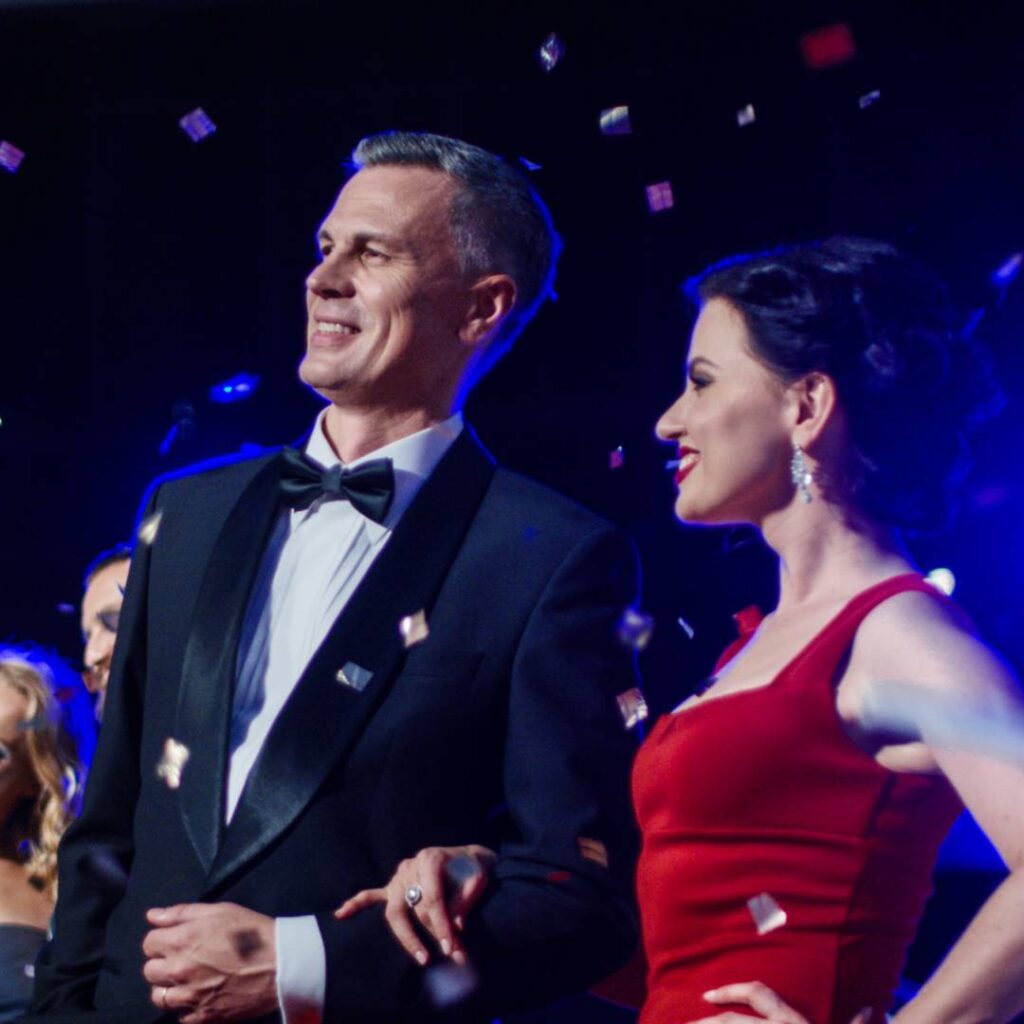 Couple dressed up and celebrating at a fundraising gala